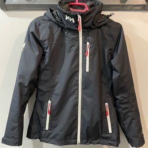 Helly Hansen rain coat. Navy blue. Size Small.